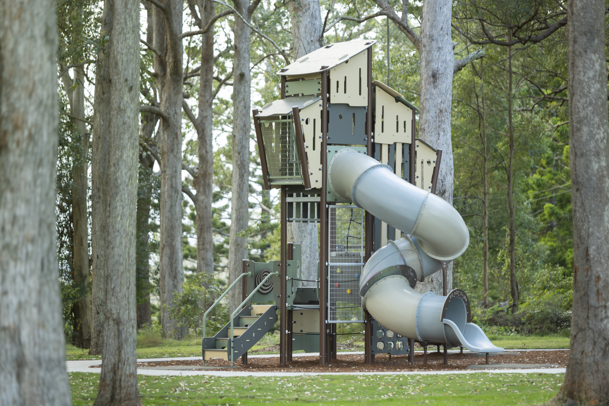 Connect playground tower in a landscaped park
